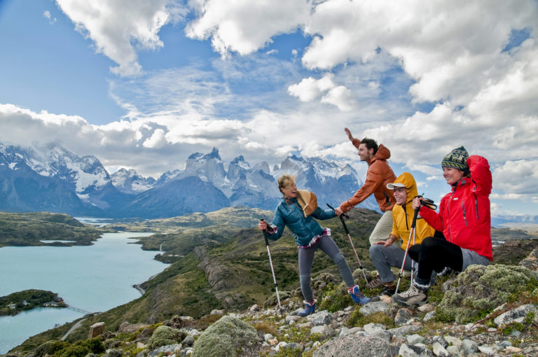 torres-del-paine-trekking-3 Group of people enjoying Torres del Paine hiking trails.