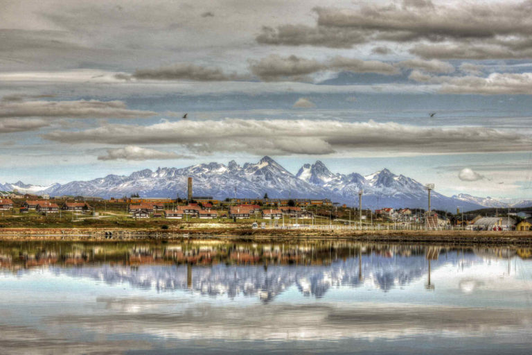 ushuaia - city and port Ushuaia with mountains in the background
