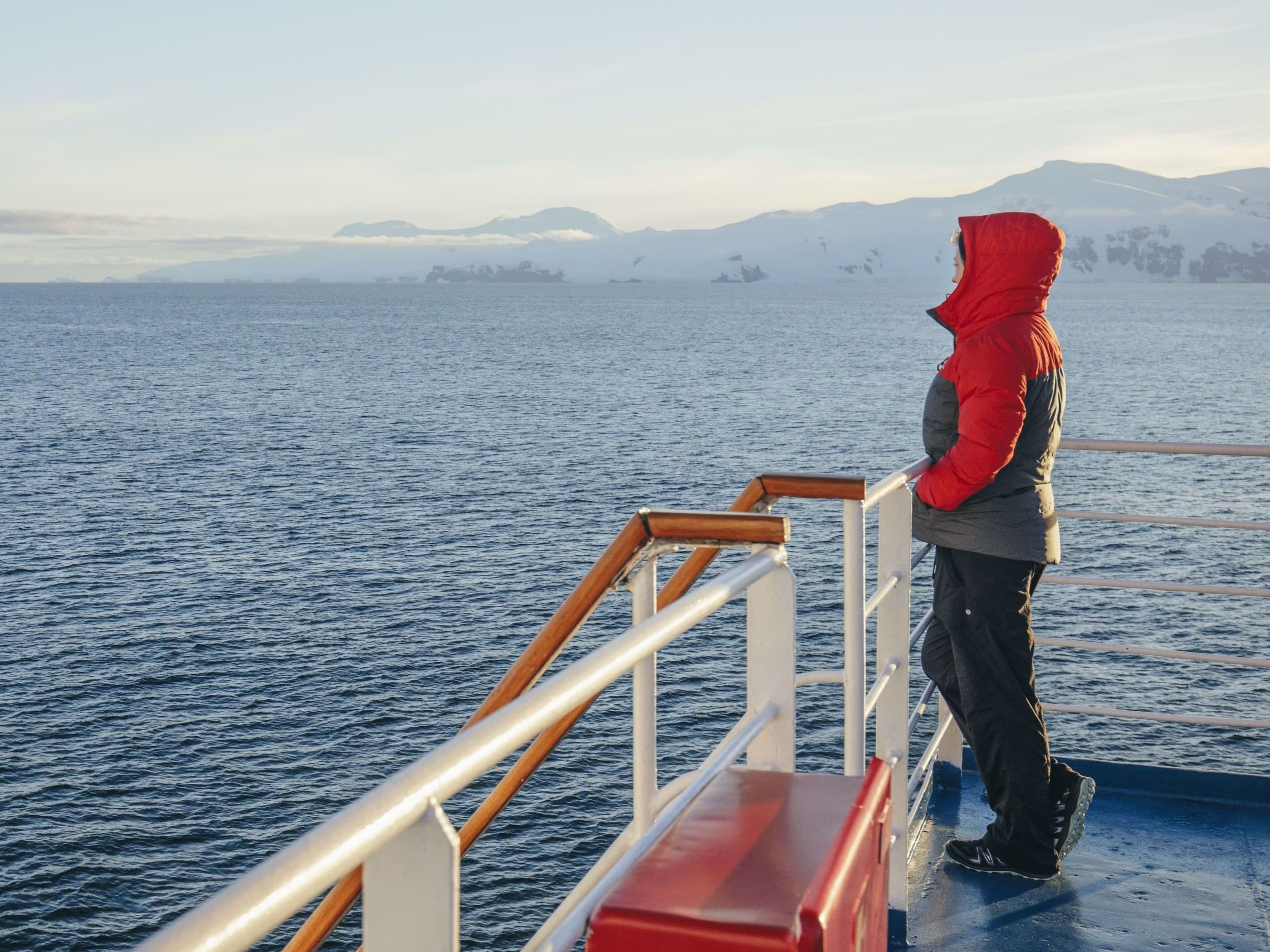 Person looking at the landscape of Antarctica 