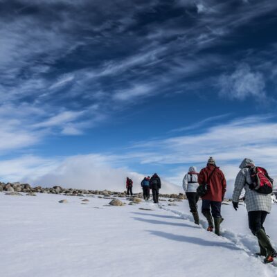 Hiking on snowy underground in the Antarctica continent