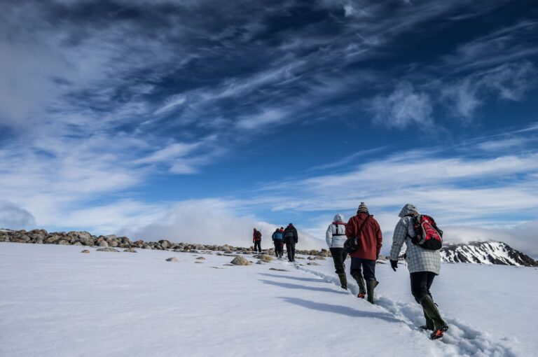 Hiking on snowy underground in the Antarctica continent