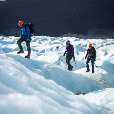 GLACIAR EXPLORADORES 2 A group of people walking in the Exploradores Glacier