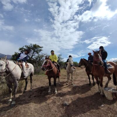 pristine-camps-calafate-horseback-ride A group of tourist horseriding in pristine camps