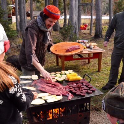 cooking-class-lucas-mallman Group of tourist cooking with Lucas Mallman in Bariloche
